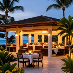 Caribbean Holidays, Adults Only Dominican Republic, Elegant adults-only resort restaurant in the Dominican Republic with outdoor tables, warm evening lighting and tropical gardens
