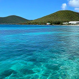 Caribbean Holidays, Adults-Only USVI, Snorkellers exploring clear Caribbean water near St John, colourful fish, coral reef and green hills in the background