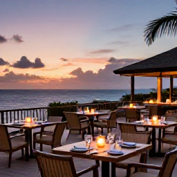 Caribbean Holidays, Antigua Adults Only, Elegant adults-only hotel terrace in Antigua with candlelit tables, Caribbean sunset and ocean views