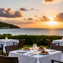 Caribbean Holidays, Antigua Holidays May, Elegant all-inclusive resort dining in Antigua at sunset, with outdoor tables, Caribbean dishes and a calm ocean backdrop