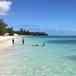 Caribbean Holidays, Antigua July Holidays, Visitors swimming and snorkelling in clear Caribbean water beside a small Antigua beach, with colourful fish and a bright blue sky