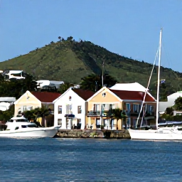Caribbean Holidays, Antigua Luxury Holidays, Historic Nelson's Dockyard in Antigua on a sunny day, with restored Georgian buildings, yachts and green hills beyond
