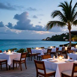 Caribbean Holidays, Antigua Luxury July, Elegant Antigua resort restaurant terrace overlooking the Caribbean Sea, tropical evening setting and beautifully presented local cuisine