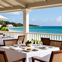 Caribbean Holidays, Antigua March Holidays, Elegant adults-only resort restaurant in Antigua serving Caribbean cuisine on an open-air terrace overlooking the sea
