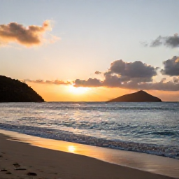 Caribbean Holidays, Antigua Nature Holidays, Sunset over Antigua's coastline with warm light on the sea, a simple beach and distant hills