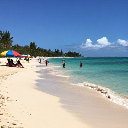 Caribbean Holidays, Antigua October Holidays, Visitors swimming and relaxing on a beautiful Antigua beach with clear water, colourful umbrellas and gentle October sunshine