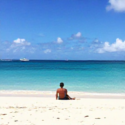 Caribbean Holidays, Antigua Solo Holidays, A lone traveller relaxing on a quiet white-sand beach in Antigua, turquoise Caribbean sea and gentle sunshine