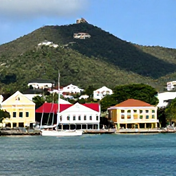 Caribbean Holidays, Antigua Solo Holidays, Solo traveller exploring Nelson's Dockyard in Antigua, colourful historic buildings, sailing boats and green hills