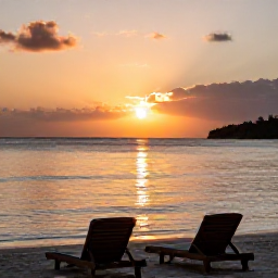 Caribbean Holidays, Antigua Wellness, Peaceful sunset over an Antigua beach with two loungers, calm water and warm evening light