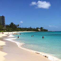 Caribbean Holidays, April Adventures, Kayakers and snorkellers exploring clear turquoise water beside a quiet Caribbean beach in Saint Kitts and Nevis