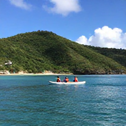 Caribbean Holidays, April Adventures, Kayakers paddling through clear calm water beside green coastal hills in St John, United States Virgin Islands