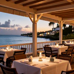 Caribbean Holidays, April Beach Holidays, A relaxed waterfront restaurant in Gustavia, Saint Barth&eacute;lemy, outdoor tables, fresh seafood and warm evening light in April