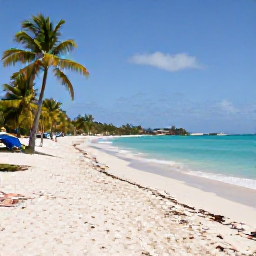 Caribbean Holidays, April Beach Holidays, A wide Caribbean beach on Saint Martin in April, turquoise water, white sand, palm trees and a relaxed holiday atmosphere
