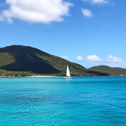 Caribbean Holidays, April Nature Holidays, Tropical British Virgin Islands coastline in April with clear turquoise water, green hills and a small sailing boat
