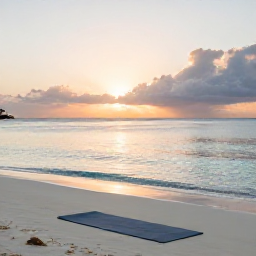 Caribbean Holidays, April Wellness Holidays, Quiet Caribbean beach at sunrise with a yoga mat, soft golden light and calm turquoise water