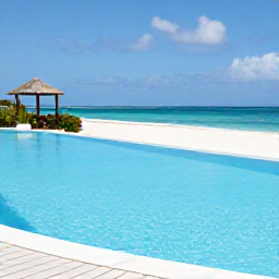 Caribbean Holidays, Aruba Adults Only, Quiet adults-only resort pool overlooking a sandy Caribbean beach in Aruba
