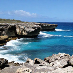 Caribbean Holidays, Aruba Adventure Holidays, Visitors exploring Aruba's rocky northern coast near natural pools, with waves, cliffs and bright blue water
