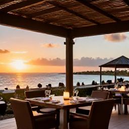 Caribbean Holidays, Aruba Business Class, Elegant Aruba evening with a seaside restaurant, warm sunset light and relaxed holiday atmosphere