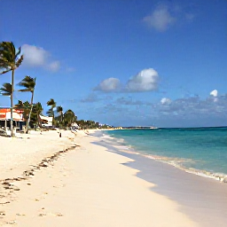 Caribbean Holidays, Aruba in April, Palm-lined Eagle Beach in Aruba during a sunny April day, with soft white sand, turquoise sea and gentle trade winds