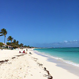 Caribbean Holidays, Aruba in January, A wide white-sand beach in Aruba under bright January sunshine, calm turquoise water, palm trees and a few relaxed holidaymakers