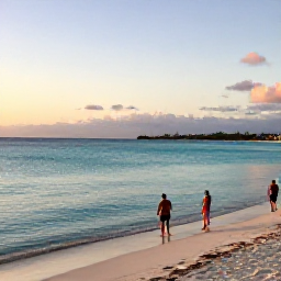 Caribbean Holidays, Aruba in January, Travellers enjoying a calm Aruban beach at sunset, with clear turquoise water, soft sand and a relaxed Caribbean atmosphere