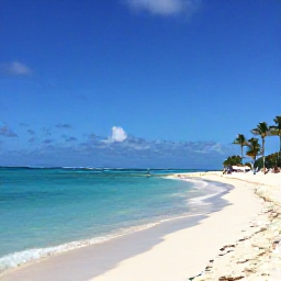 Caribbean Holidays, Aruba in November, A calm Aruban beach in November with turquoise water, white sand, gentle trade winds and visitors relaxing beneath palm trees