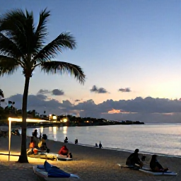 Caribbean Holidays, Aruba Instagram Hotspots, A peaceful evening at Palm Beach in Aruba, with calm sea, beach lights and people enjoying the sunset