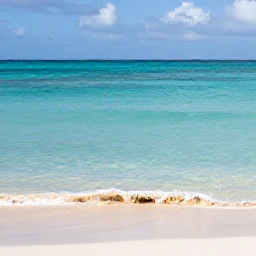 Caribbean Holidays, Aruba Nature Holidays, Quiet Aruba beach at Christmas time with clear shallow water, pale sand and low golden sunlight