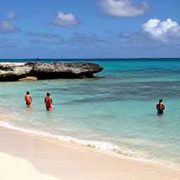 Caribbean Holidays, Aruba November Holidays, Aruba beach with colourful snorkellers, clear shallow water and rocky coastline under bright Caribbean sunshine