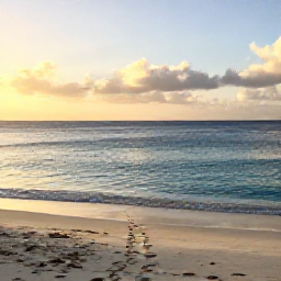 Caribbean Holidays, Aruba Walking Holidays, A peaceful Aruban beach at sunrise with a marked walking path, calm blue sea and low golden light