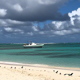 Caribbean Holidays, August Adventures, Small boat approaching a quiet sandy cay with dramatic blue water and seabirds in Turks and Caicos