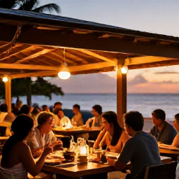 Caribbean Holidays, August Beach Holidays, Outdoor Caribbean restaurant at sunset with diners enjoying fresh seafood, warm lights and a relaxed island atmosphere