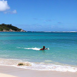 Caribbean Holidays, August Beach Holidays, Traveller swimming and snorkelling in clear turquoise water beside a sandy Caribbean beach in Saint Vincent and the Grenadines
