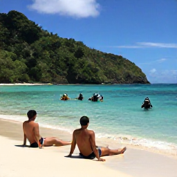 Caribbean Holidays, August Diving, Friendly divers relaxing on a tropical Dominica beach after a morning scuba dive, with rainforest hills in the background