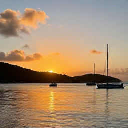 Caribbean Holidays, August Instagram Hotspots, Sunset over Cruz Bay on St John, with anchored boats, tropical hills, glowing sky and reflections on calm Caribbean water