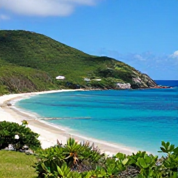 Caribbean Holidays, August Nature Holidays, A sunny coastal landscape on St John in the United States Virgin Islands, with turquoise sea, green hills and a quiet sandy beach in August