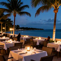 Caribbean Holidays, Bahamas August Break, Evening waterfront dining in Nassau with outdoor tables, warm lights, palm trees and a relaxed holiday atmosphere