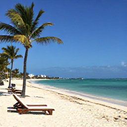 Caribbean Holidays, Bahamas February, Beautiful Cable Beach near Nassau in February, with soft white sand, calm turquoise sea, sun loungers and palm trees