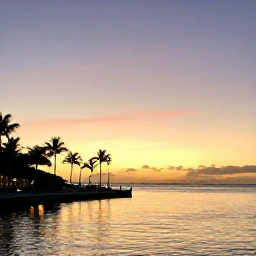Caribbean Holidays, Bahamas Instagram Spots, Colourful sunset over Nassau harbour with palm silhouettes and calm Caribbean water in the Bahamas