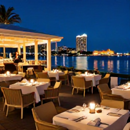 Caribbean Holidays, Bahamas January Breaks, Elegant Nassau evening scene with outdoor dining, softly lit restaurants, live music and harbour lights reflecting on the water