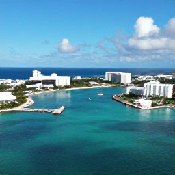 Caribbean Holidays, Bahamas Multi-Centre, A bright aerial photograph of Nassau harbour, turquoise Bahamian water, white-sand beaches and a sunny March sky