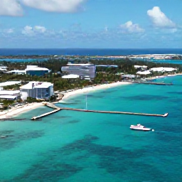 Caribbean Holidays, Bahamas Multi-Centre, A bright aerial view of Nassau harbour, turquoise Bahamian water, white beaches and a cruise boat in July sunshine