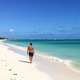 Caribbean Holidays, Bahamas Solo Holidays, A solo traveller walking along a quiet white-sand beach in Nassau, Bahamas, with clear turquoise water and bright April sunshine