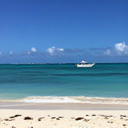 Caribbean Holidays, Bahamas Tours October, Turquoise sea and white sand beach in Nassau, Bahamas, with a small boat offshore beneath a bright October sky