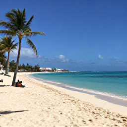 Caribbean Holidays, Barbados Business Class, Sunny Barbados beach in March with calm turquoise sea, pale sand, palm trees and a few relaxed holidaymakers