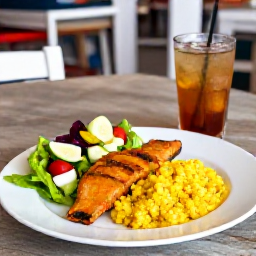 Caribbean Holidays, Barbados City Breaks, Barbadian lunch served at a welcoming Bridgetown caf&eacute;, featuring flying fish, cou-cou, fresh salad and a rum-based drink
