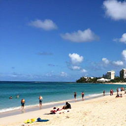 Caribbean Holidays, Barbados February, Sunny Carlisle Bay in Barbados with turquoise water, golden sand and visitors enjoying a relaxed February beach day