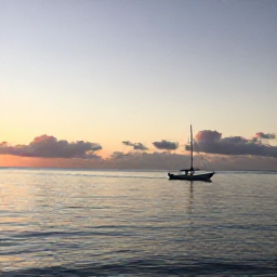 Caribbean Holidays, Barbados Fishing August, A calm Barbados coastline at sunrise with a small fishing boat heading out to sea