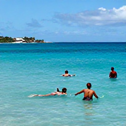 Caribbean Holidays, Barbados in April, Visitors swimming and snorkelling in clear Caribbean water at Carlisle Bay, Barbados, on a sunny April day