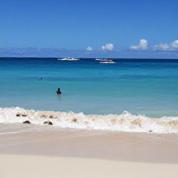 Caribbean Holidays, Barbados in October, A calm Barbados beach with gentle waves, sun loungers and clear Caribbean water suitable for swimming and watersports